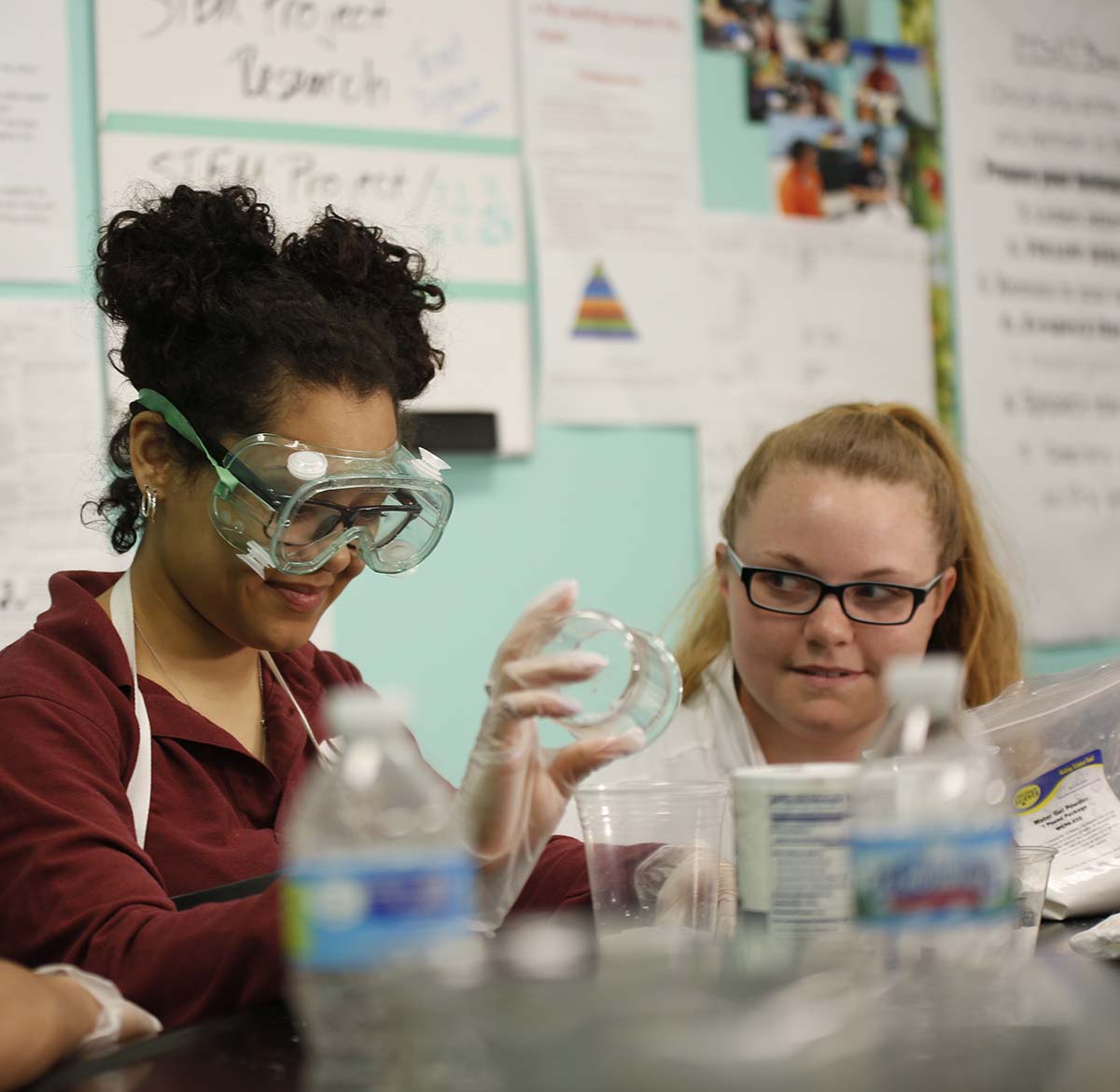 Horizon Science Academy Toledo Teacher and student interacting at a classroom desk